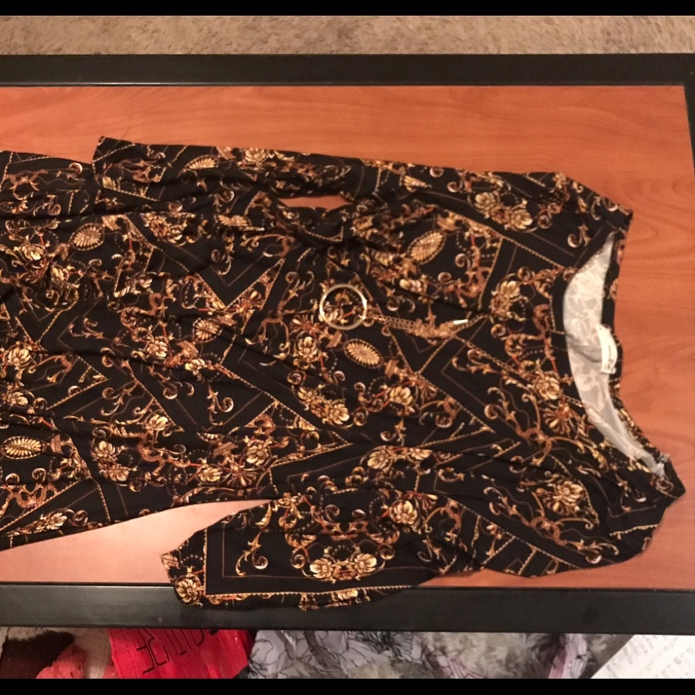 Black and gold long sleeved dress